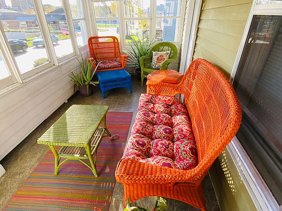 410 East Mill Street sun porch with plants
